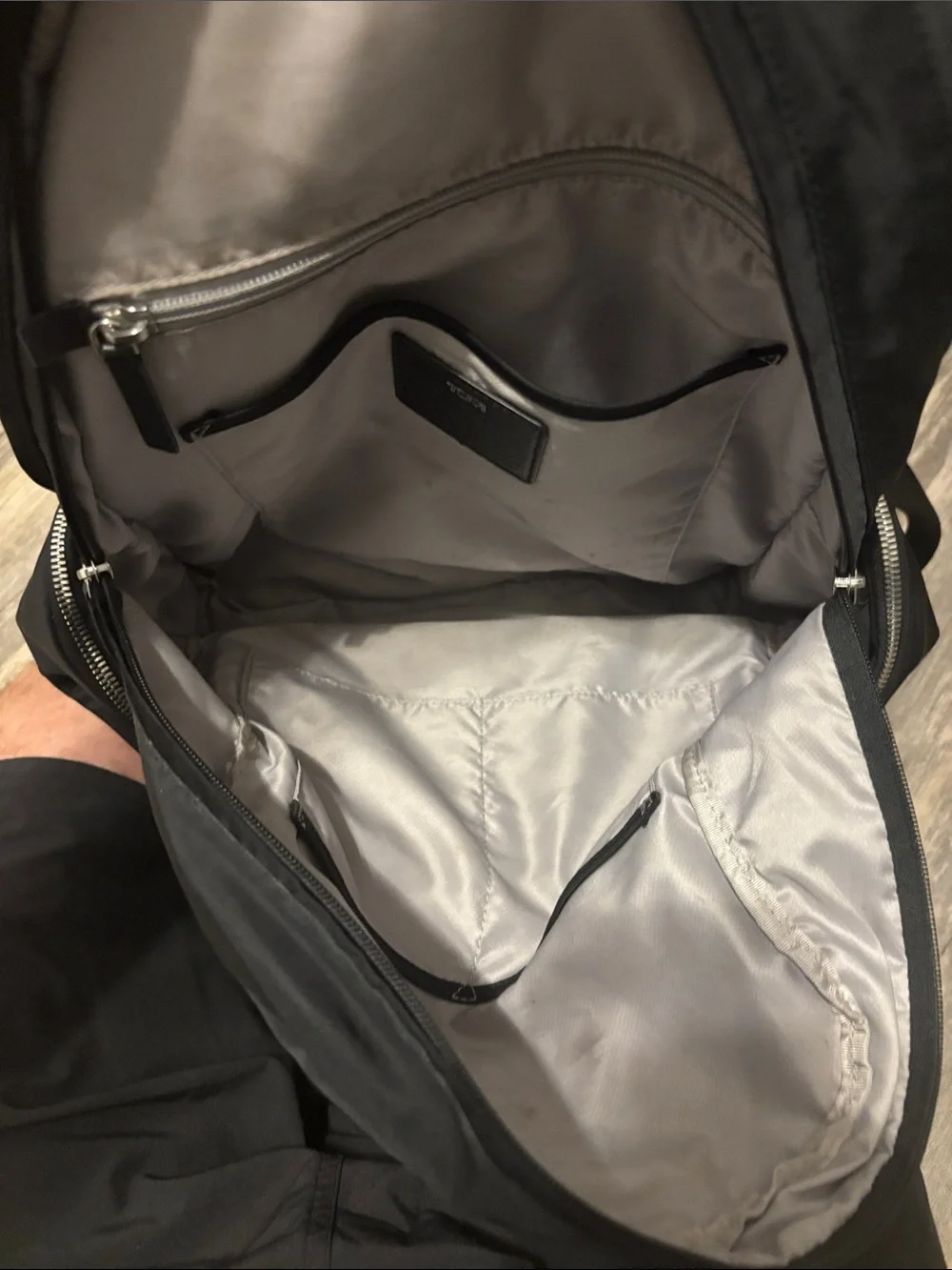 Tumi Black Nylon Backpack with Front Zip Pockets
